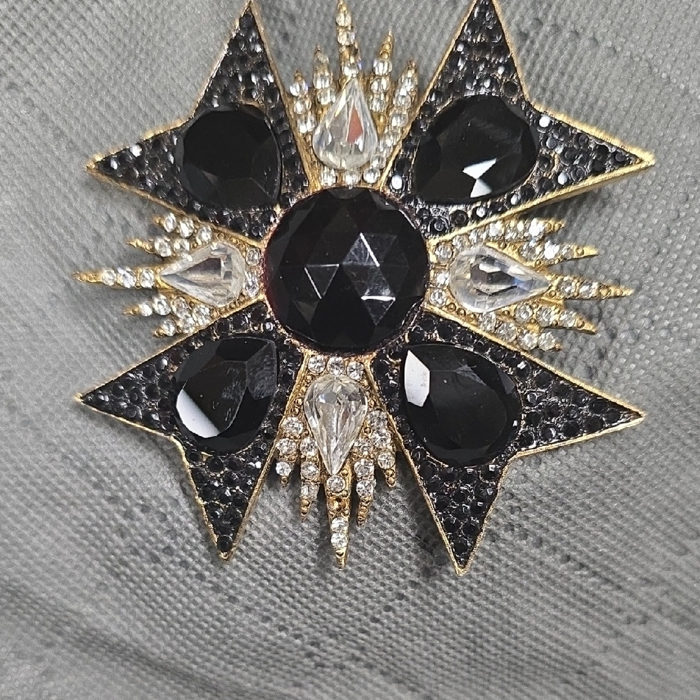 Elegant Black and Gold Brooch